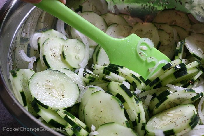 Mixing Cucumber Salad