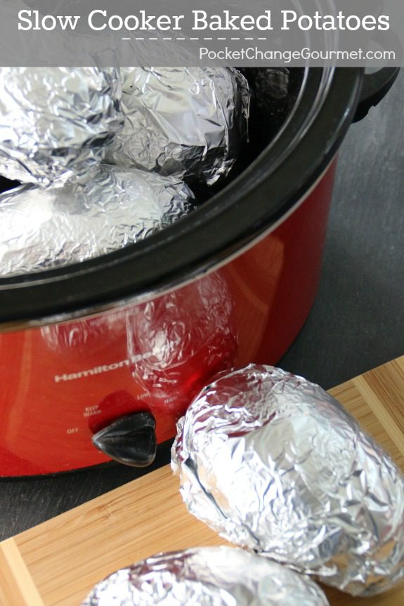 Slow Cooker Baked Potatoes - a simple and easy side dish, or add your favorite toppings and serve a Baked Potato Bar! Pin to your Recipe Board!