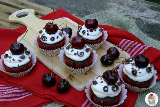 cherries on top of the cupcakes