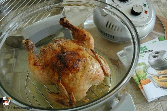 a cooked whole chicken in a oil-less fryer