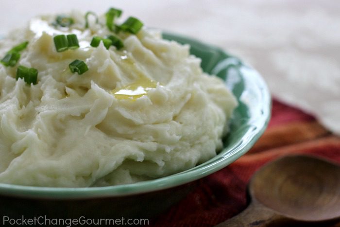 The ultimate comfort food - Fluffy Mashed Potatoes! Come on over and learn the secret ingredient to making the best Mashed Potatoes ever! Pin to your Recipe Board!