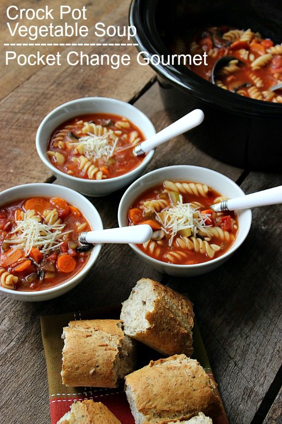 3 serves of crock pot vegetable soup and slices of bread with a big bowl in the side