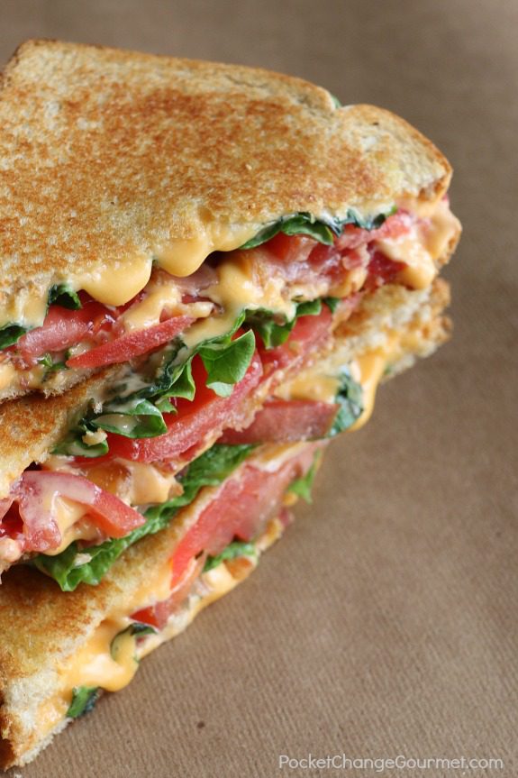 The classic Grilled Cheese Sandwich just-grew-up! Crunchy bacon - flavorful lettuce - and juicy tomatoes are added to send this sandwich over the top! Pin to your Recipe Board!