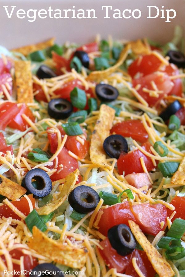 This easy to make 9 layer Vegetarian Taco Dip is perfect for Taco Night, Movie Night or to serve at Parties! Pin to your Recipe Board!