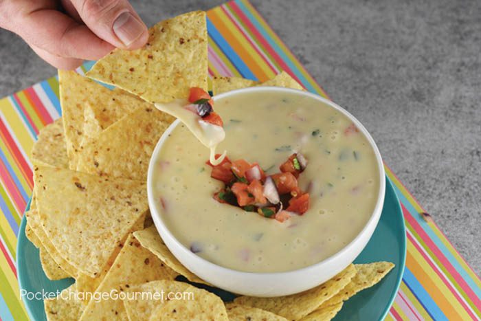 Just like you get at your favorite Mexican restaurant - this White Queso Dip Recipe is creamy and delicious! Serve as an appetizer or as a side with your favorite Mexican meal!
