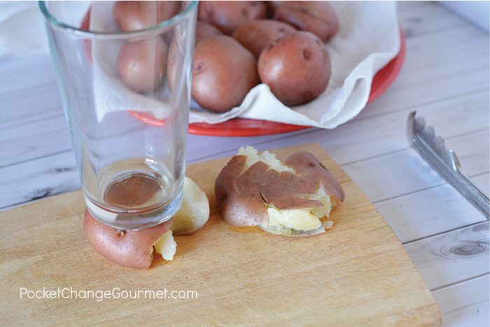 Use a drinking glass to smash potatoes.