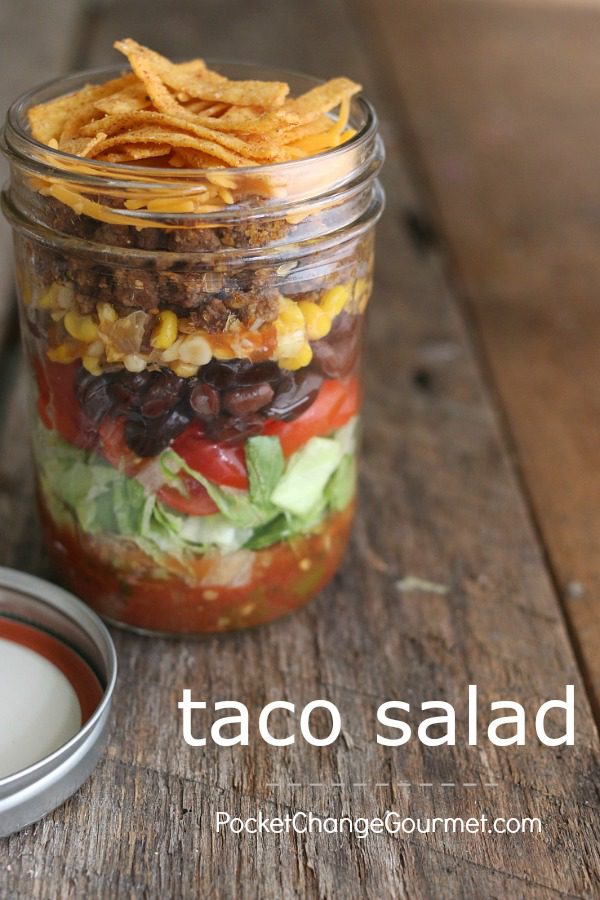 Taco Salad in a Jar -- This quick and easy lunch recipe is not only delicious, it's packed with healthy food! Layers of lettuce, tomatoes, beans and more! 