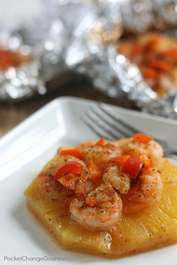 These simple to make Pineapple Shrimp Foil Packets go together in minutes with only 6 ingredients! Make them while camping or grill them for a SUPER easy weeknight meal! 