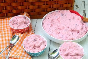 COTTON CANDY SALAD -- This easy salad recipe is maybe more like a dessert with cherry and strawberry pie filling, whipped topping and more! It's makes the PERFECT Potluck Recipe!
