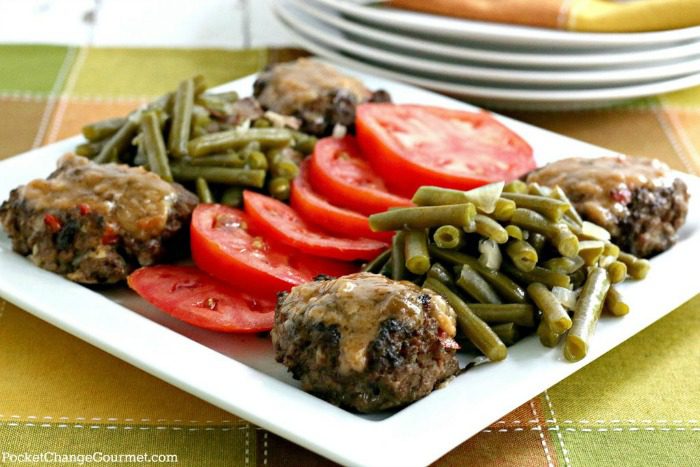 OVEN BAKED HAMBURGER STEAKS -- Change up your traditional hamburgers and give these oven baked hamburgers a try! They are moist, delicious and have a creamy gravy over top!