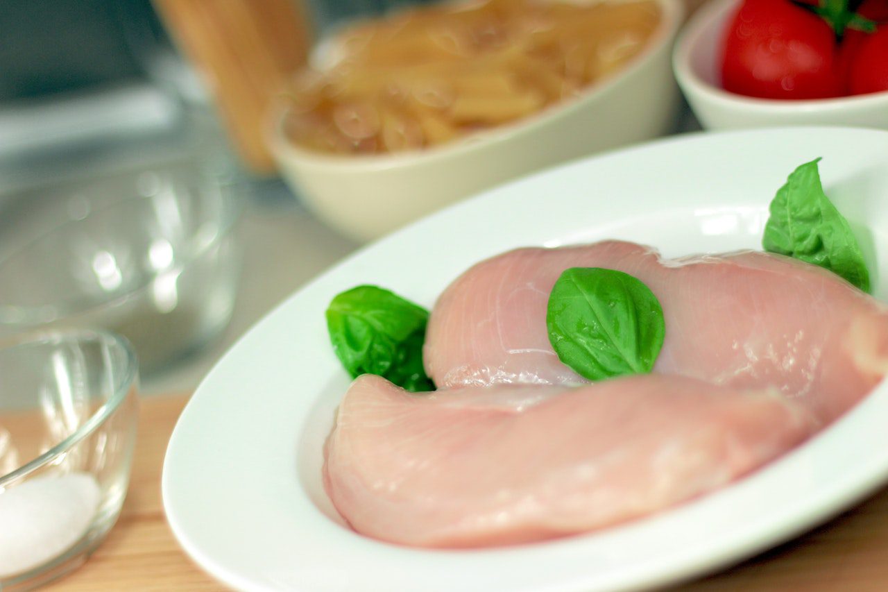 fresh meat on plate for poppy seed chicken
