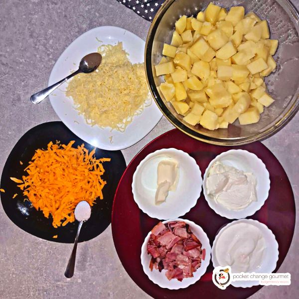 full ingredients of mashed creamy potato in bowls