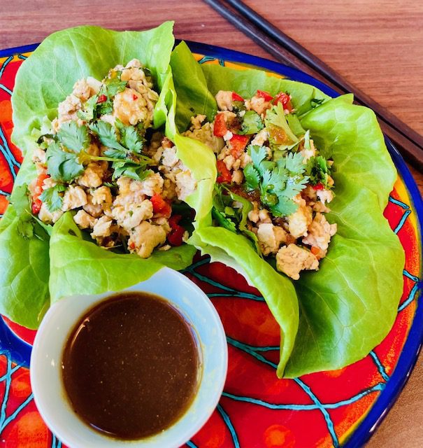 Asian Turkey Lettuce Wrap on plate with dipping sauce